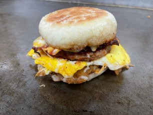 This Rocket Sando has turkey sausage, bacon, smashed tots, a hard egg and melted cheese